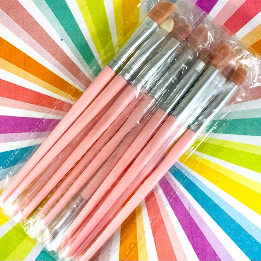 Full set of synthetic eye shadow brushes with blush pink handles